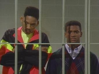 will and carlton looking dejected from behind bars