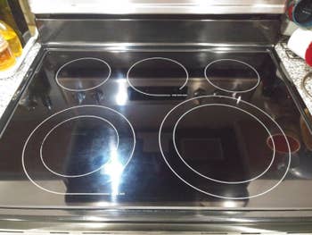 same reviewer showing their stovetop looking good as new