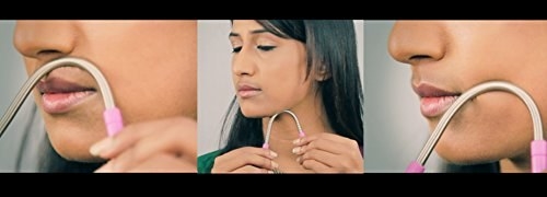A woman trimming her upper lip hair with the hair remover,