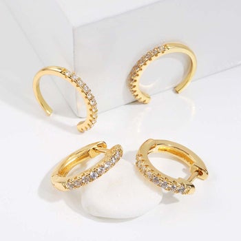 various gold earring cuffs