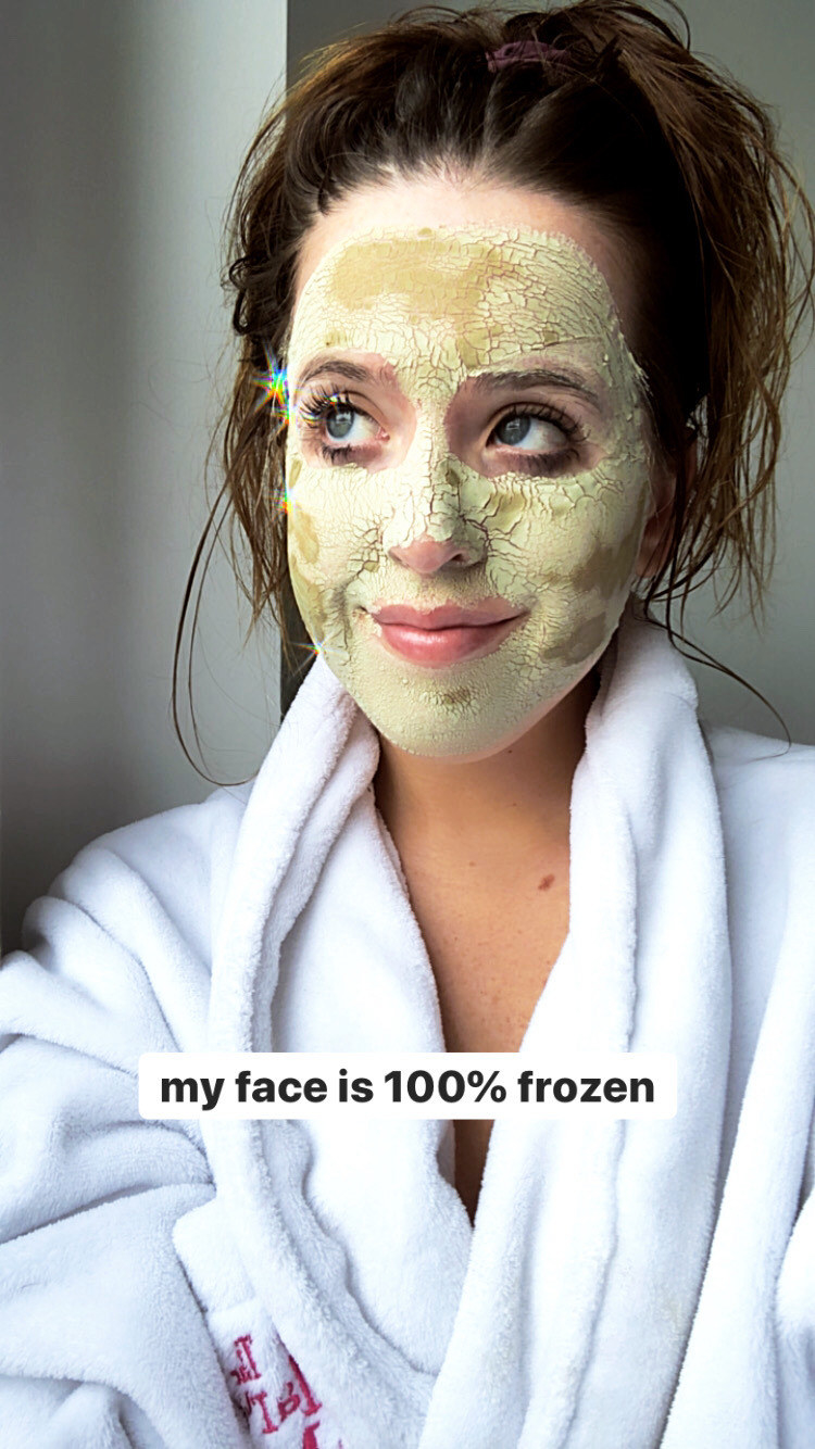 A portrait of a person in a bathrobe with the face mask on their skin with the caption &quot;My face is 100% frozen&quot;