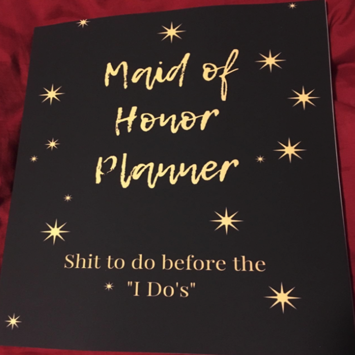the planner which says "maid of honor planner"