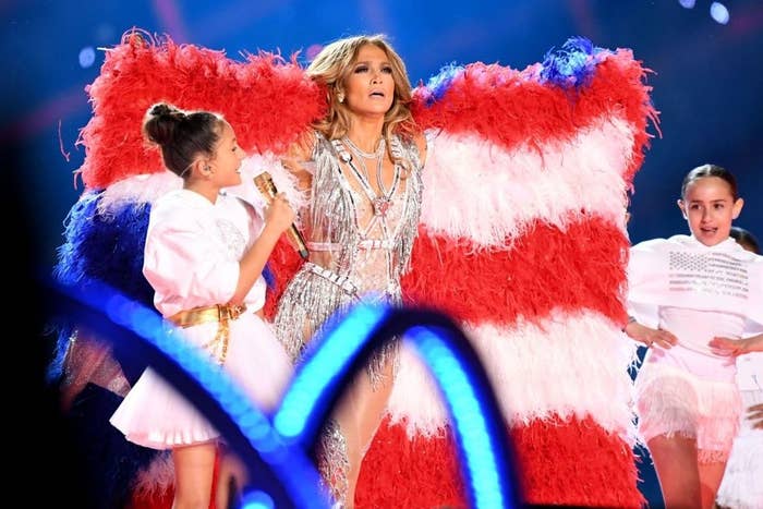 Emme Maribel Muñiz and Jennifer Lopez perform onstage during the Pepsi Super Bowl LIV Halftime Show.