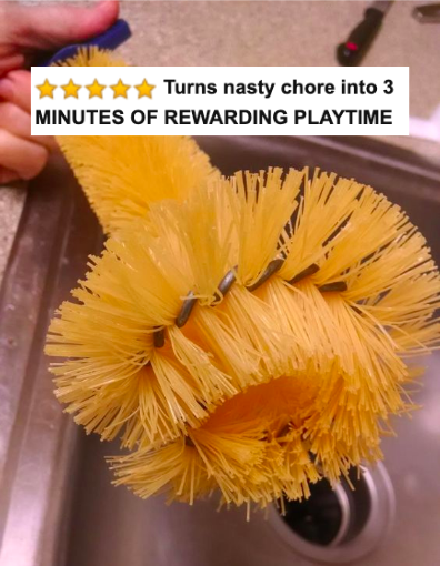 reviewer photo of the yellow garbage disposal brush