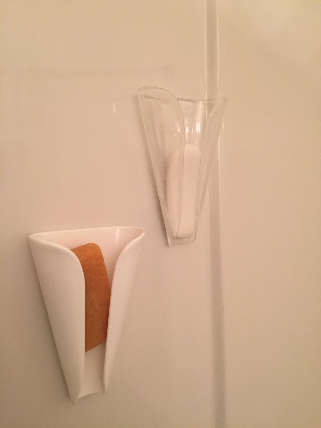 Reviewer photo of the soap holder, one white and one clear