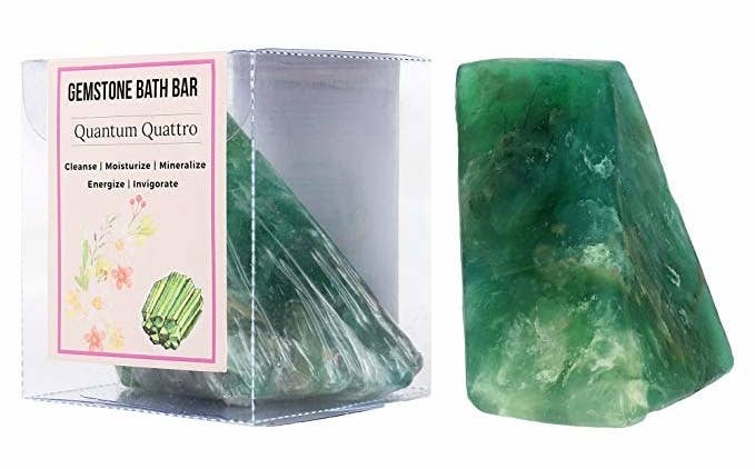 A green gemstone bath soap bar inside and outside its box