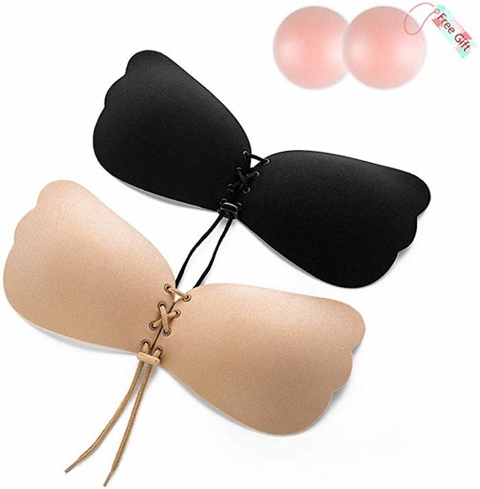 Two strapless bras (one nude and one black) that have a drawstring in the center. There are also silicone nipple covers.