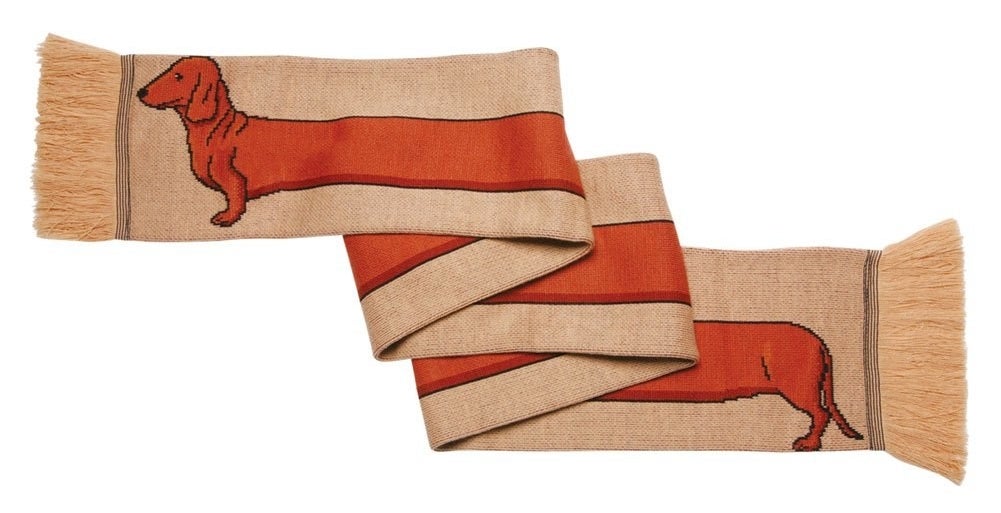 the scarf with a long dachshund stretching across it