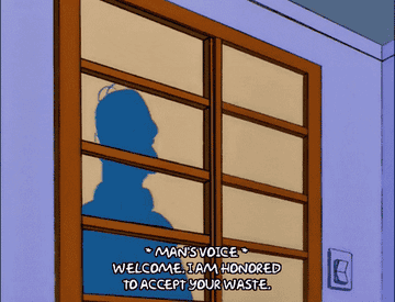 Homer simpson looking at a high-tech toilet that says &quot;welcome I am honored o accept your waste&quot;