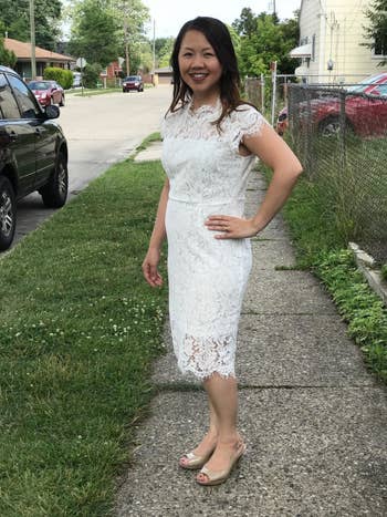 another reviewer wearing the dress in white