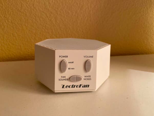 a reviewer&#x27;s photo of the white noise machine 
