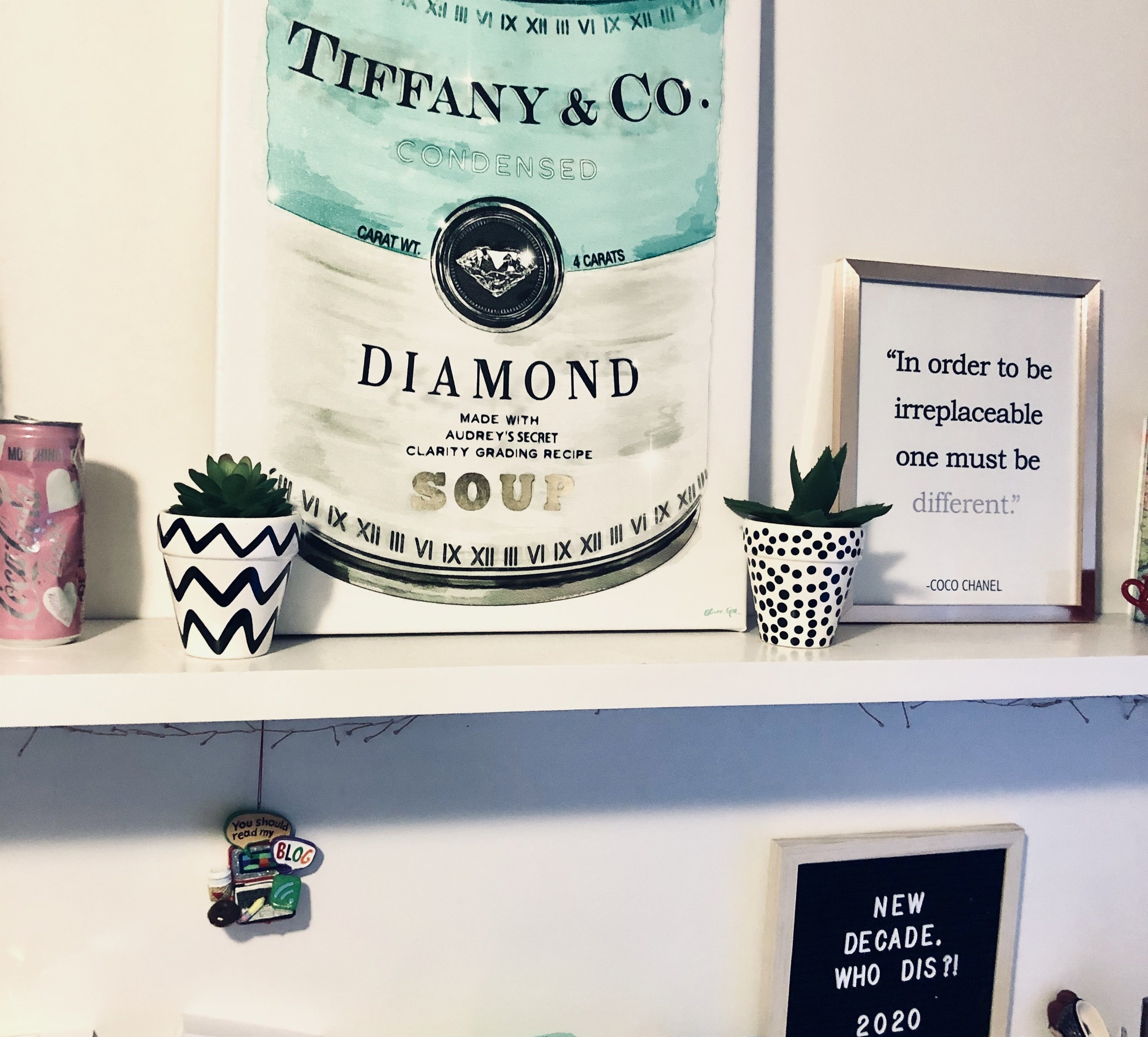the canvas art of a tiffany and co. soup can in a buzzfeed editor&#x27;s room 