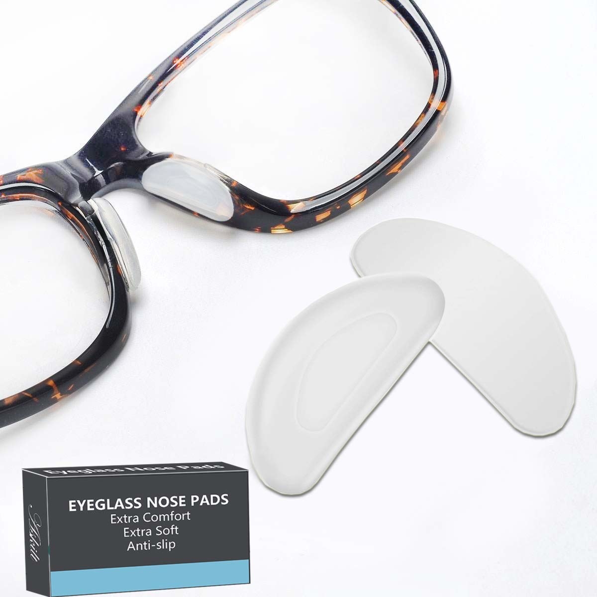 A pair of glasses with the nose pads on them