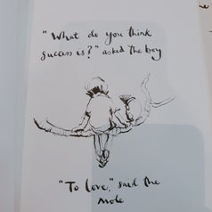 a page from the book showing a drawing and quote