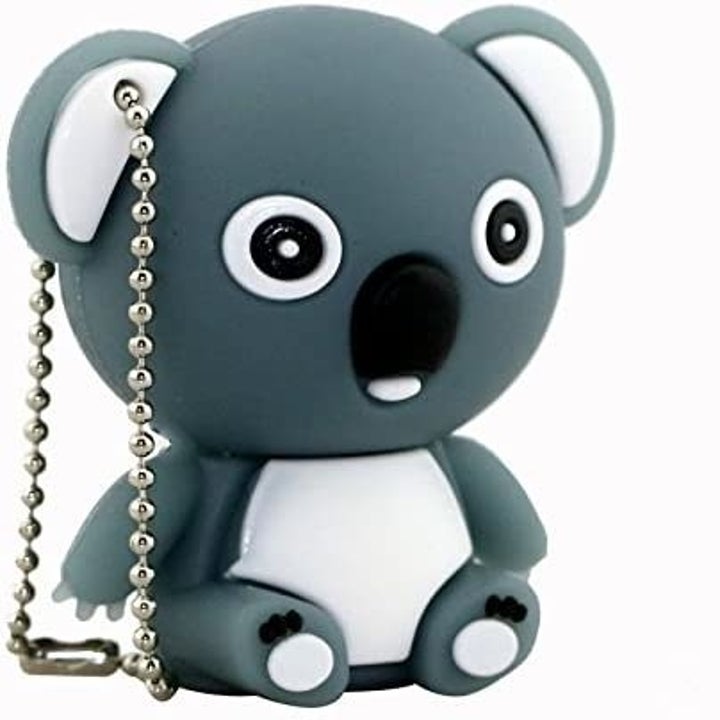 A USB flash drive with silicone cover in the shape of a koala bear
