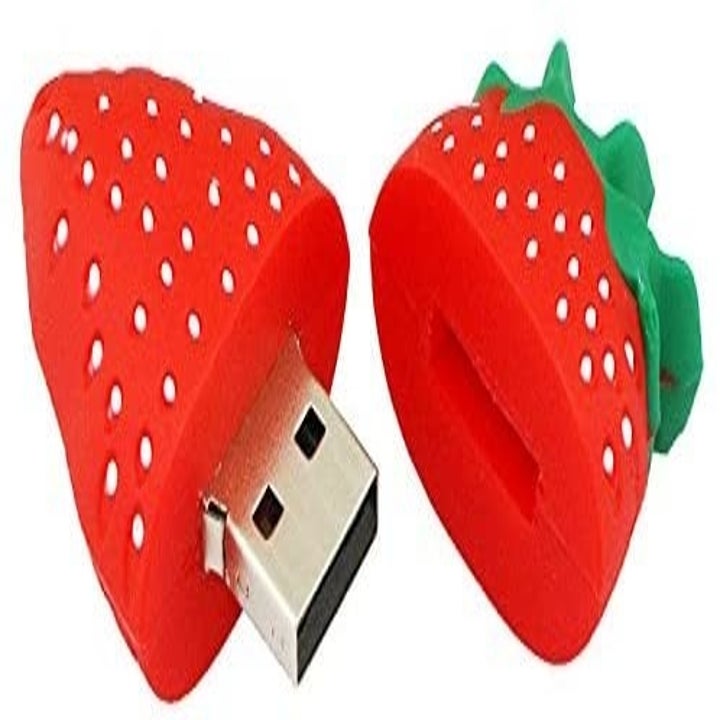 A USB flash drive with a silicone cover in the shape of a strawberry