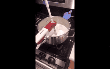 Gif of the hands-free stirrer in action