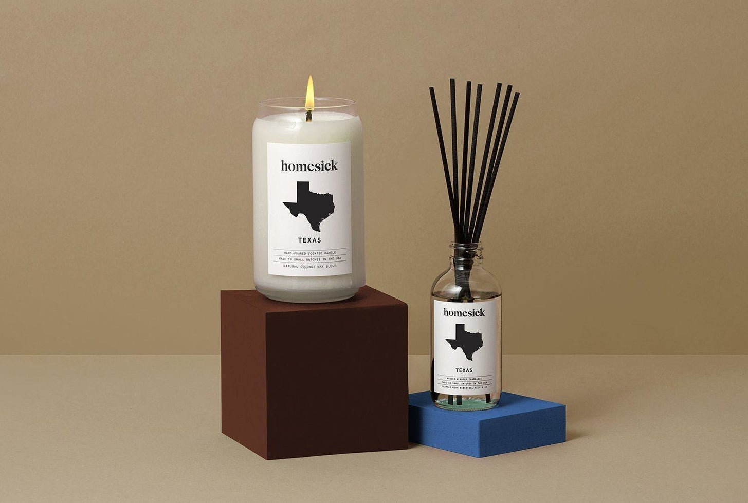 The candle and diffuser in Texas scent. The labels show the name and shape of the state 