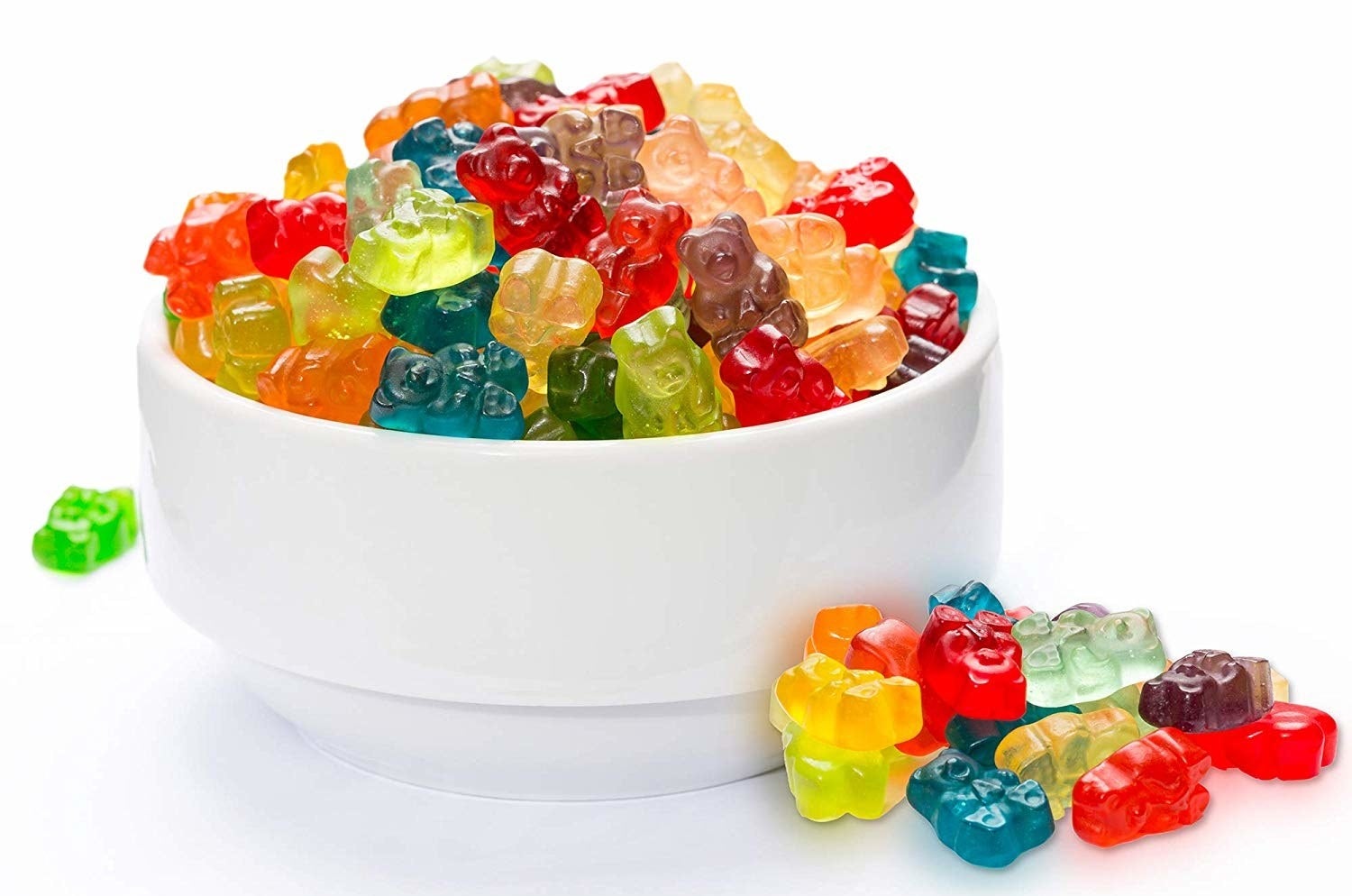 The colorful gummies in a white bowl