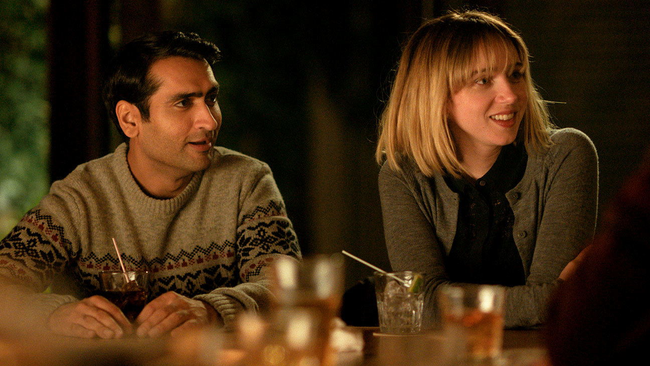 Kumail and Emily sitting together