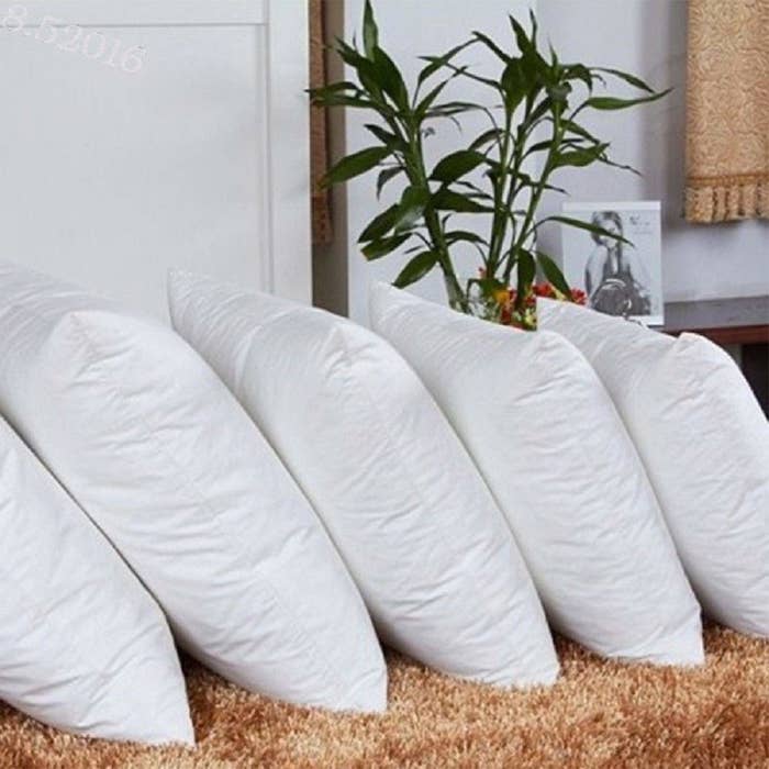 A set of  white cushions