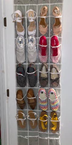 Reviewer uses the same over-the-door shoe organizer to stash their kitten heels and slip-on sneakers