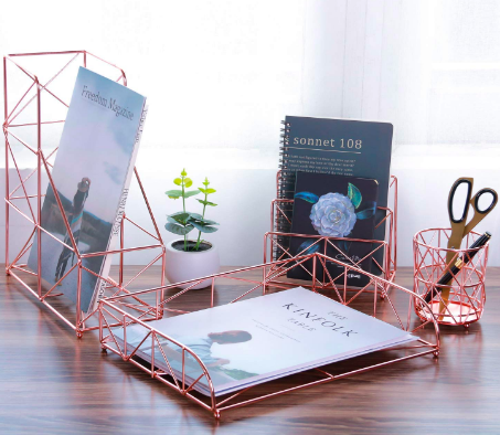 Rose gold desk organizer set with a pen cup, magazine holder, and letter holder