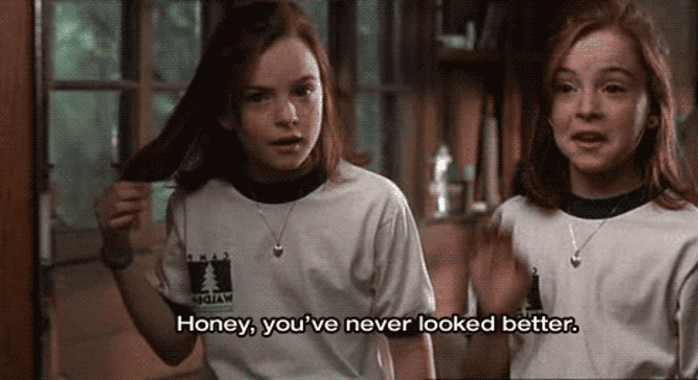 a gif of hallie and annie from the parent trap saying &quot;honey, you&#x27;ve never looked better&quot;