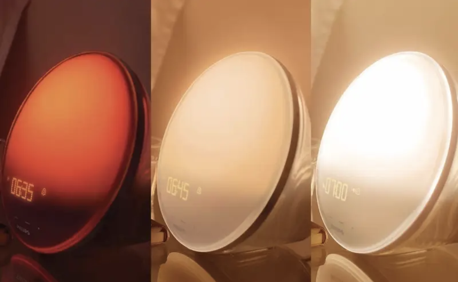A sunrise alarm clock in three stages of lighting up from dim to brighter to brightest over the course of a half hour 