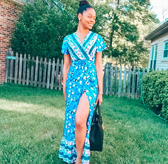 reviewer wearing floral maxi dress 