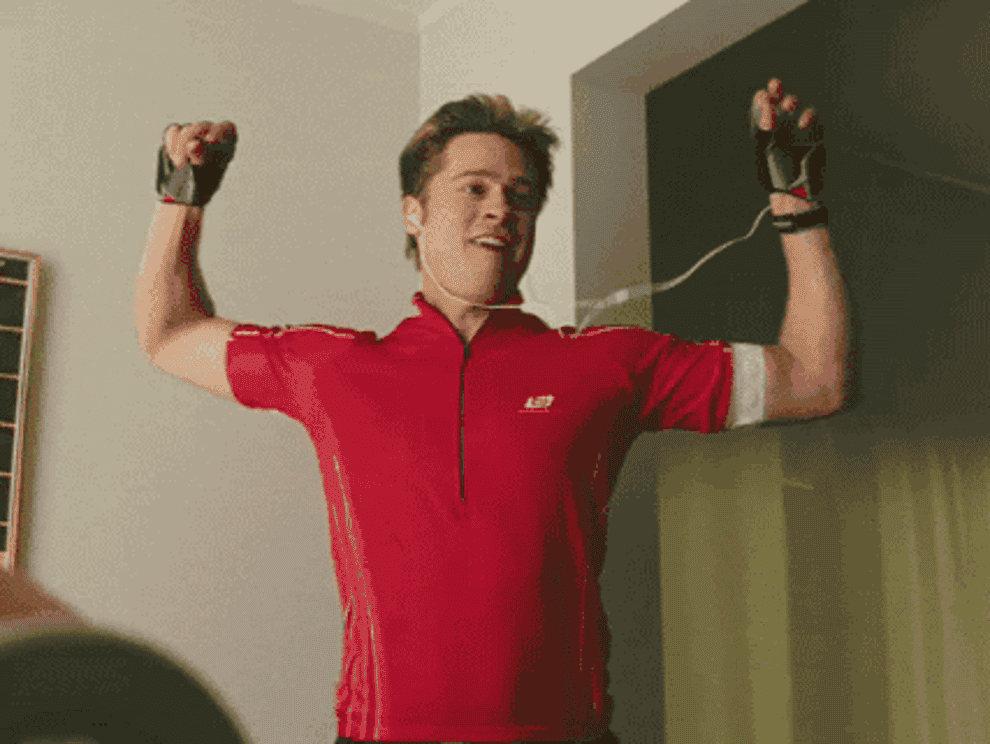 Gif of Brad Pitt doing a funny-looking workout 