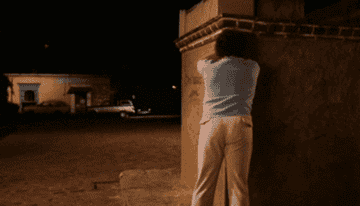 A gif of someone clenching their butt