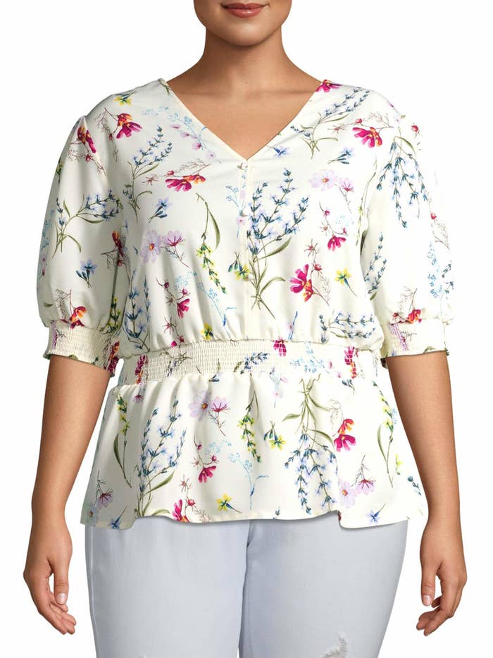 The cinched white floral top with puff sleeves