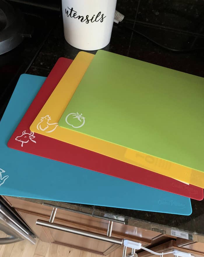 Four color-coded mats no bigger than the traditional folder size that are green, yellow, red, and blue