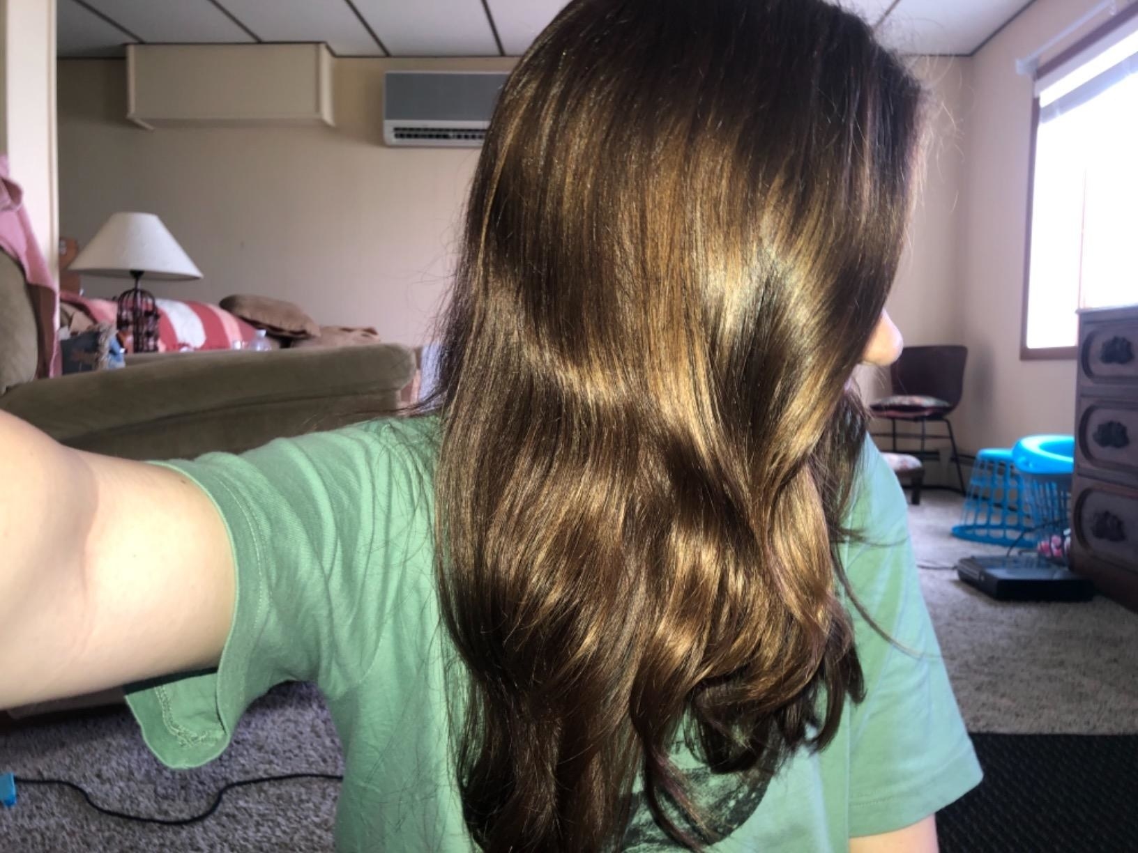 reviewer with shiny brown hair
