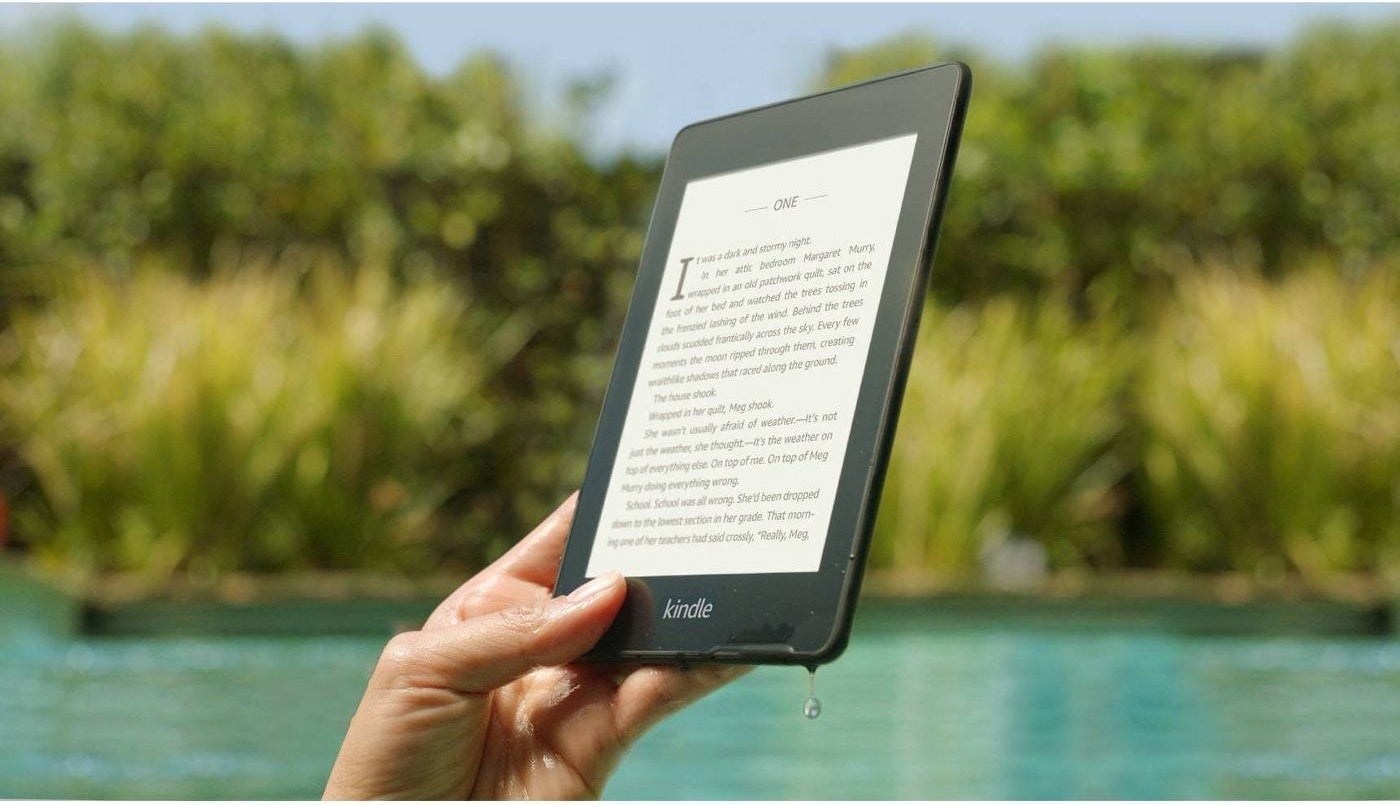 Hand holding a wet kindle
