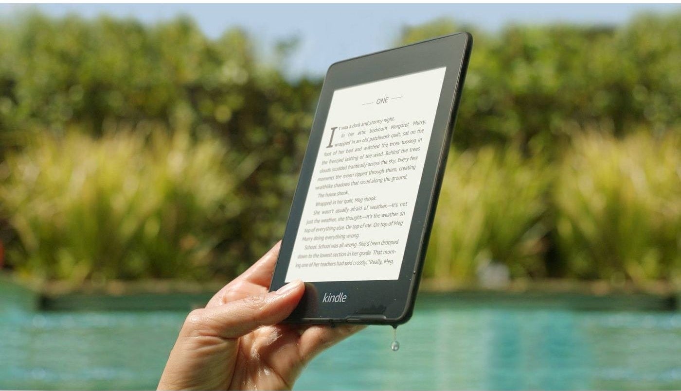 Hand holding a wet kindle