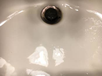 A customer review after photo of the same sink with all the stains removed