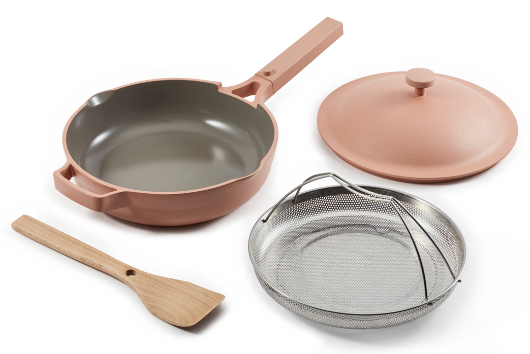The pan, spatula, steamer, and lid in the color spice