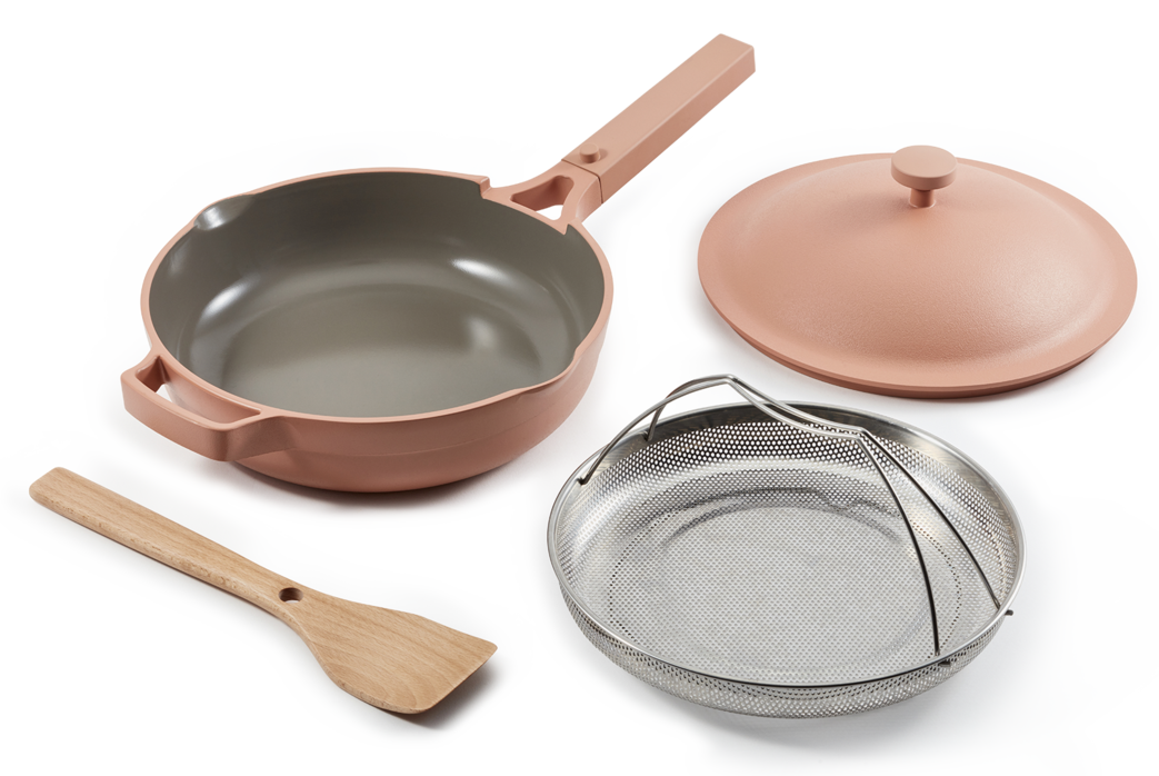 The pan, spatula, steamer, and lid in the color spice