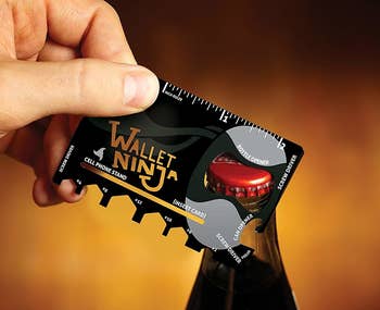 The tool being used to open a bottle 