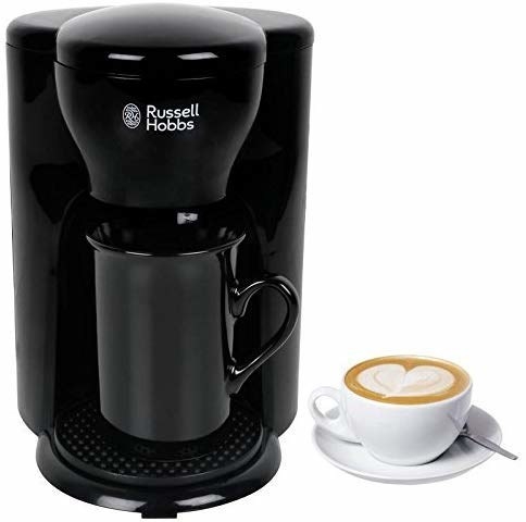 A black Russell Hobbs coffee maker with a cup of coffee next to it