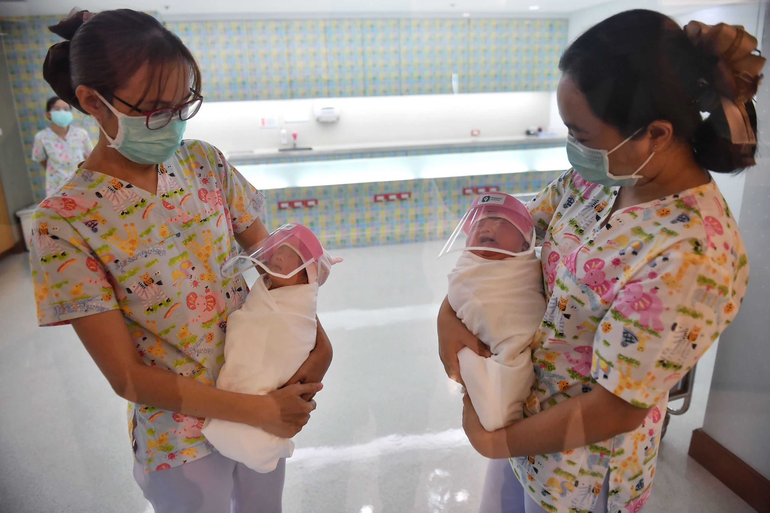 Newborns in face shields because of coronavirus concerns