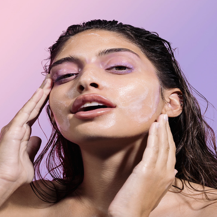 model lathering the product on their skin