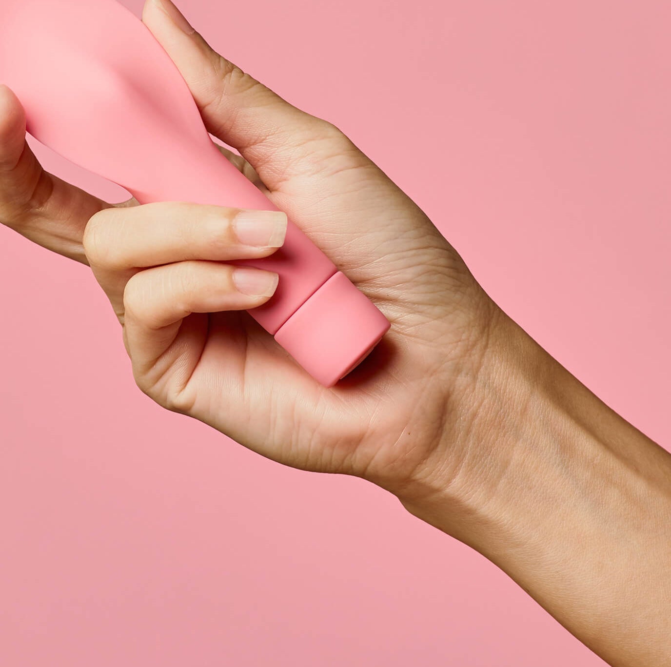 A person holding up the vibrator