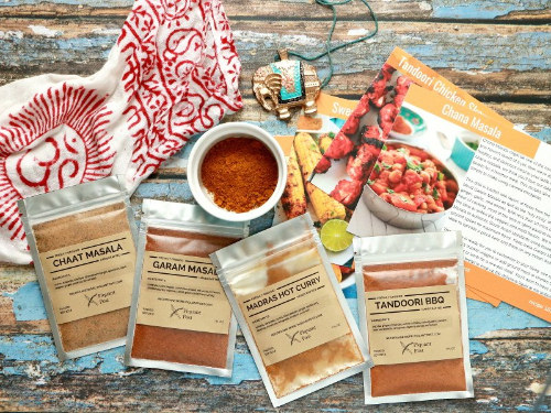 an array of spices in individual bags