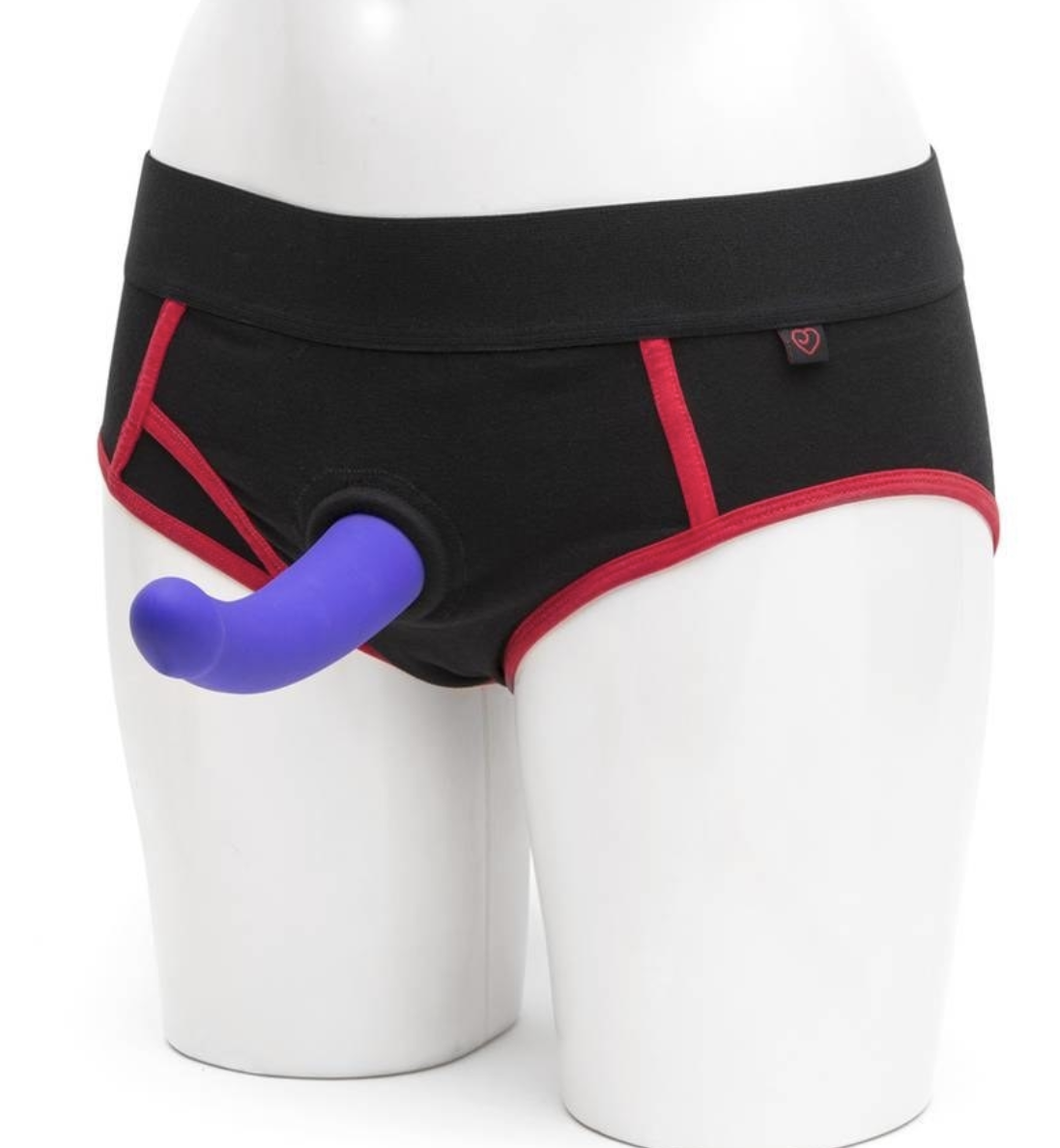 Mannequin wears black and red strap-on harness brief with purple dildo