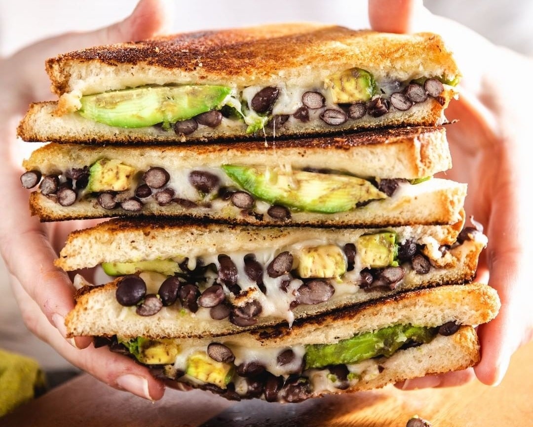 an avocado black bean melt sandwich