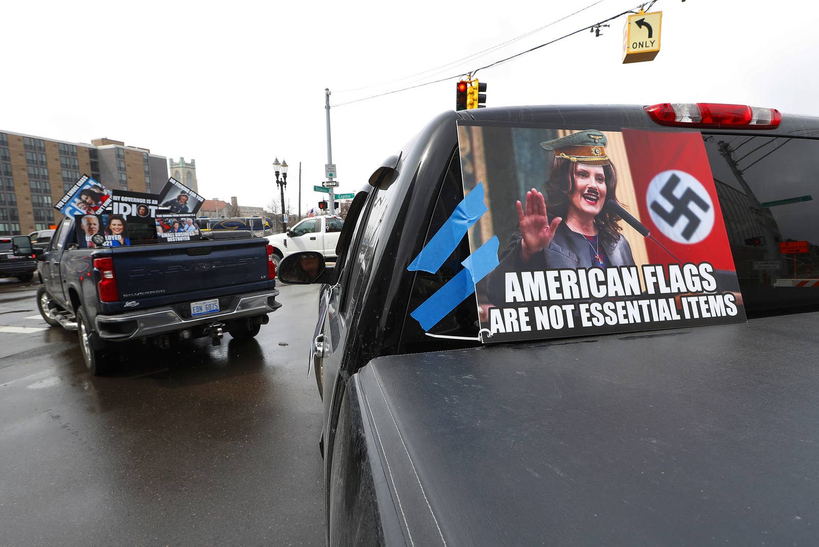 Photo of anti-lock down protests April 16, 2019. Attributed to Paul Sancya / AP and linked from Buzzfeed News. 