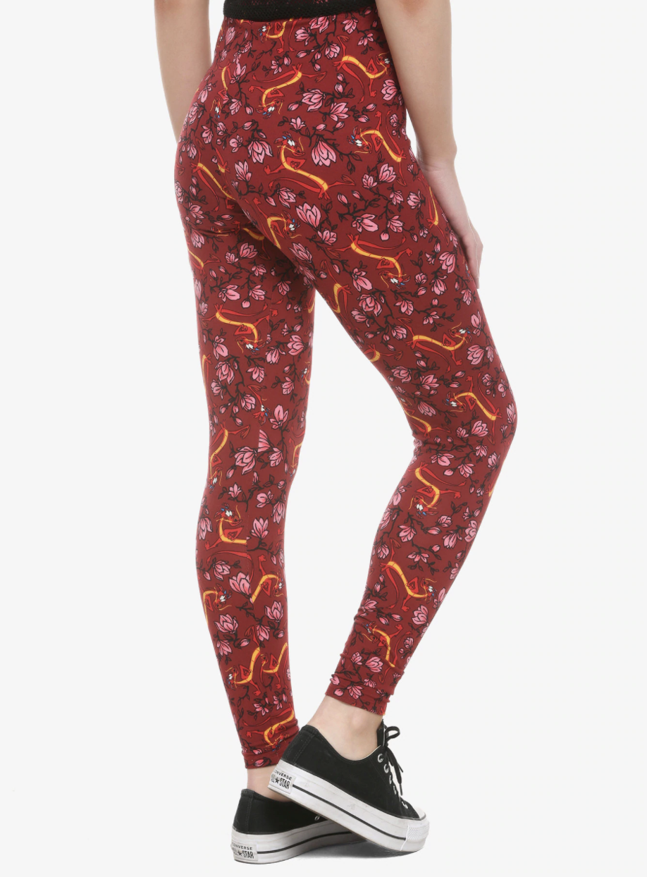 mulan print leggings in red with lotus flowers and mushu on them